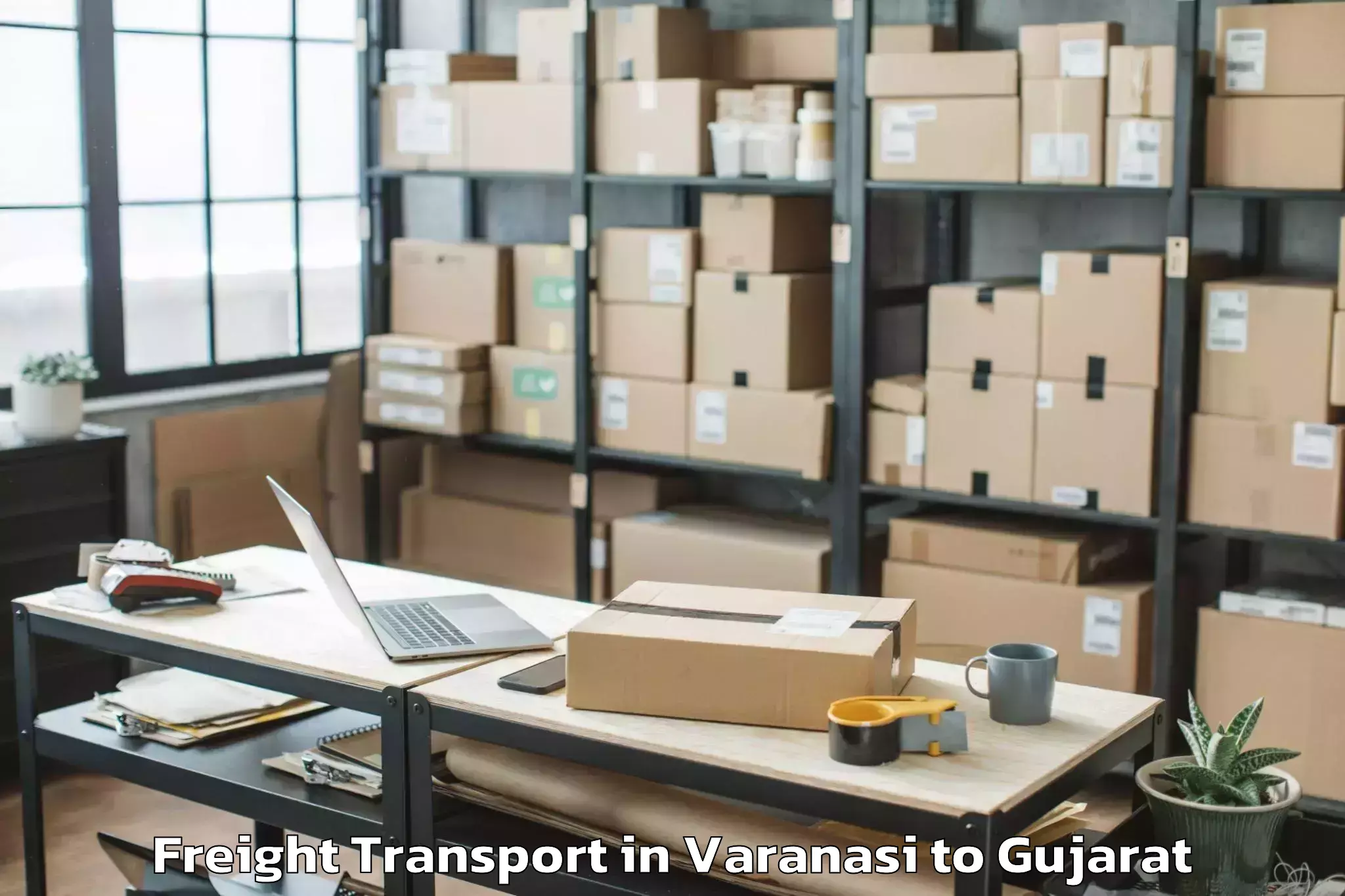 Book Varanasi to Jhulasan Freight Transport Online